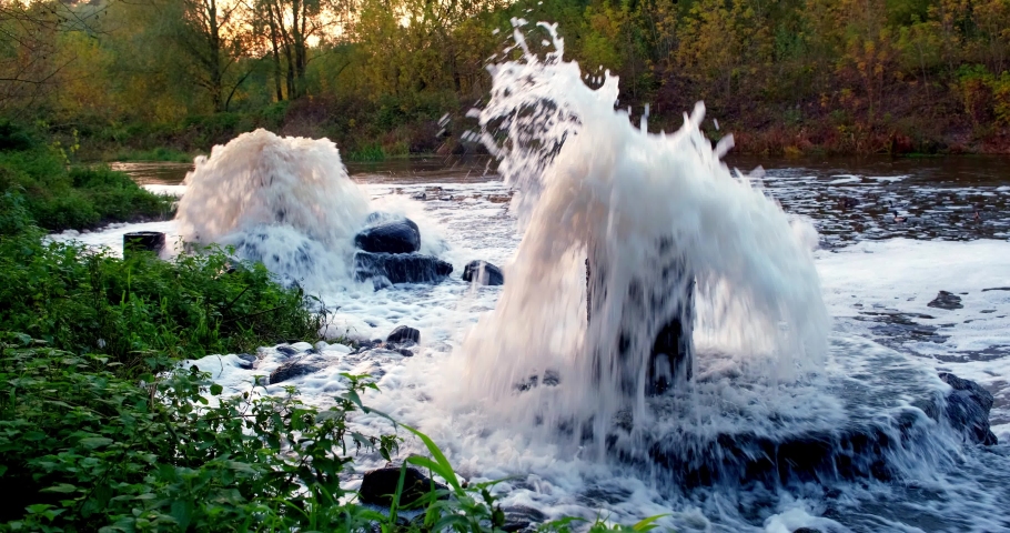 mixing zone of sewage discharge of urban sewage. river pollution. city dumps 