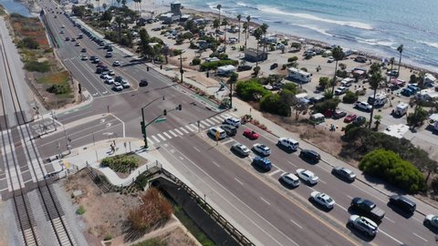Panoramic aerial view of Cardiff State Beach in California. Drone flyover shot