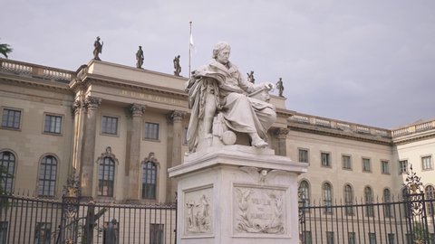 BERLIN, GERMANY - Oct 25, 2021: Wilhelm von Humboldt statue outside Humboldt University, Berlin, Germany. German city in summer. travel destination in Europe.