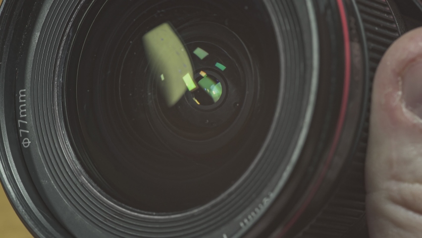 Focusing lens of digital camera. The Lens Of The Camera. Close-Up. Camera Focus Focusing And Shooting. Concept of proffesional service for photographic or filmmaker equipment.