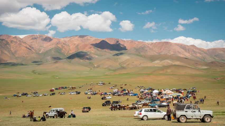 Timelapse view of people gathering for the traditional Naadam Festival in West Mongolia. The festival is held throughout the country during midsummer in various outdoor locations.