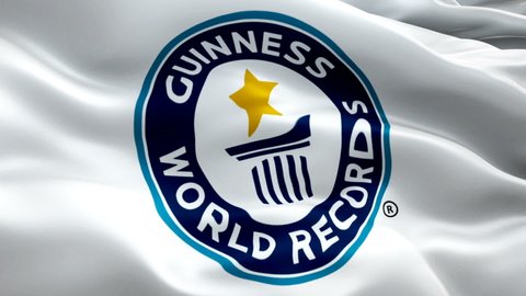 Animation of Guinness World Records logo. Realistic Guinness Book Flag background. Guinness Book Flag Looping Closeup 1080p Full HD 1920X1080 footage. Guinness World Records logo HD video - New York, 4 July 2021
