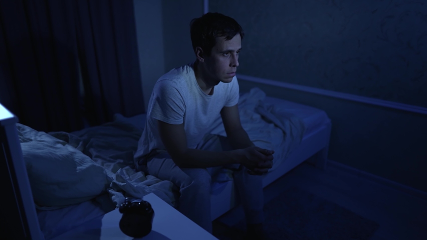 Man having depression sitting on the bed Royalty-Free Stock Footage #1082671030
