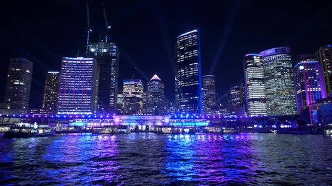 SYDNEY, NSW, AUSTRALIA. JUNE 11 2019. Arriving at Circular Quay during Sydney Vivid festival.