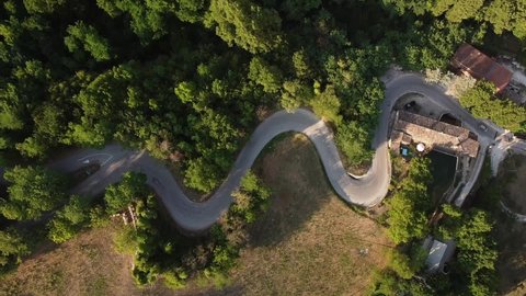 Full hd aerial footage of a beautiful hairpins location in Italy - white van on the road