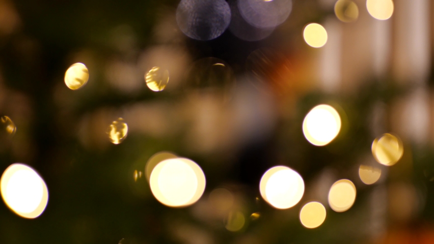 Fairy light on a Christmas tree festive blurred bokeh abstract background  Royalty-Free Stock Footage #1082685901