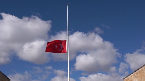 Ankara, Turkey - November 10 2021: On this day, which is the anniversary of Ataturk's death, Turkish people visit Anıtkabir, and the Turkish flag was lowered to half as a matter of mourning.