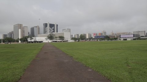 Brasília, DF, Brazil, November 21, 2021: Esplanade of the ministries, Panoramic video view showing museum, cathedral, banking sector, ministries and National Congress on a cloudy day