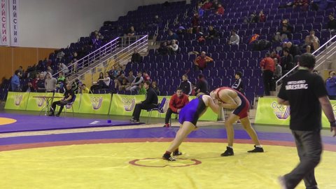 Orenburg, Russia - March 15-16, 2017: Boys compete in the sports wrestling at the Volga Federal District Championship in sports wrestling 