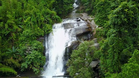 Aerial view of Sirithan waterfall with spray of water Splashing one of the famous waterfall at Doi Inthanon National Park mountain. Located in Chiang Mai, Thailand. 