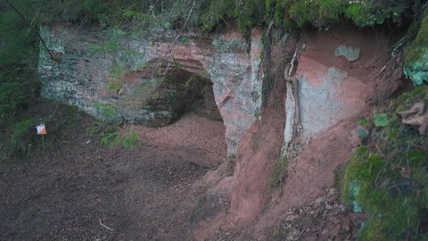 The 40 m Long Ziedleju Cliffs Consists of the Reddish Sandstones From Gauja Suite. A Sandstone Outcrop on the Banks of Gauja River, Incukalns, Latvia. Latvija Nature in the Gauja Nacional Park.