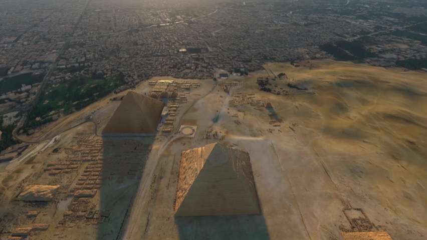 Aerial bird view of Giza Pyramid Complex also called Necropolis is site on the Plateau in Greater Cairo Egypt that includes the Pyramids of Khafre, Khufu and Menkaure 4k high resolution animation Royalty-Free Stock Footage #1082722978