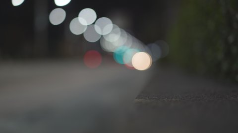 blur light bokeh by car headlight and street light on the street road in city to movement or motion at dark night for background