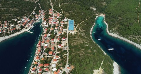 Aerial view of sporting place on hilltop between a paradise bay and Zavalatica town on Korcula Island, Dalmatia, Croatia.