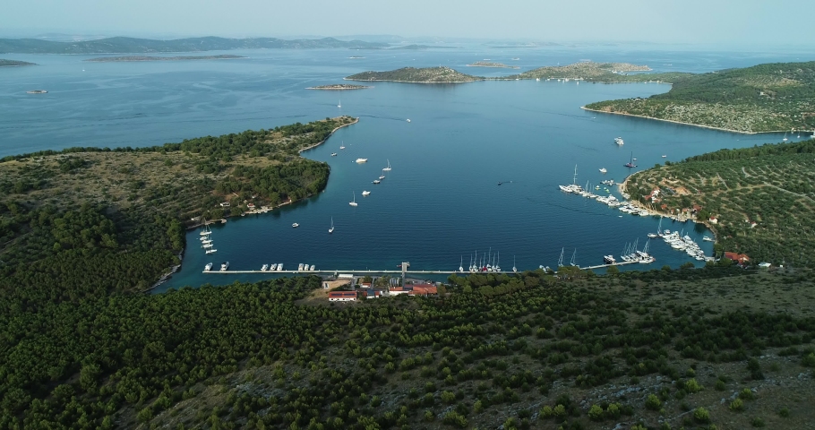 Aerial view of a small harbour with sailing boat on Zut Island, Dalmatia, Croatia.