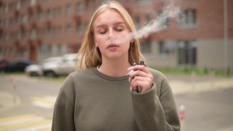 Young Woman Smokes Street Portrait Young Stock Footage Video (100% ...