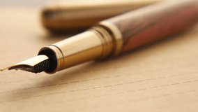 envelope , empty paper and fountain pen on table  - Powered by Shutterstock - Get 15% off with code: PIKWIZARD15