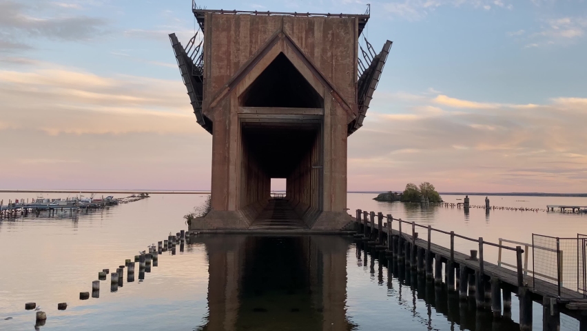 Old ore docks, now abandoned in Marquette Michigan, on Lake Superior at sunset