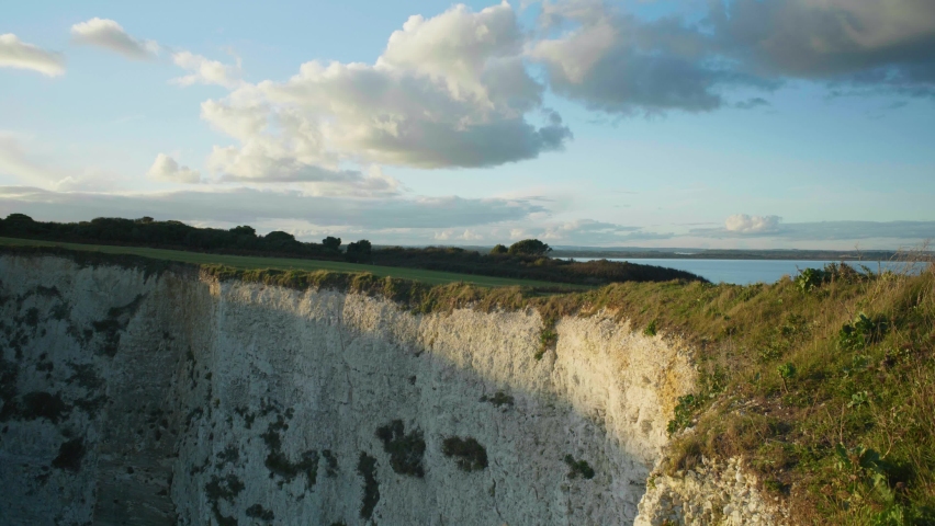 4K Landscape shot of a view of cliffs on the southern English coast line, at Old Harry Rocks, in Dorset.