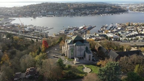 Cinematic 4K aerial drone footage of Saint Mark's Episcopal Cathedral on Capitol Hill, Eastlake, Lake Union, Union Bay near downtown Seattle, Washington