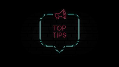 Glowing neon line Megaphone icon with text Top tips isolated on black background. Top tips neon sign in speech bubble frame with megaphone. 4K Video motion graphic animation.