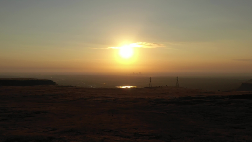 North Table Mountain Park at Sunrise. Denver Downtown. Aerial View. Golden, Colorado, USA. Drone Flies Forward