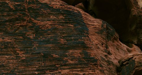 Ancient petroglyphs are chipped and chiseled over more archaic petroglyphs authored by a long forgotten ancestor.  Accompanied by a subtle, hypnotic, and tasteful motion controlled tracking shot.
