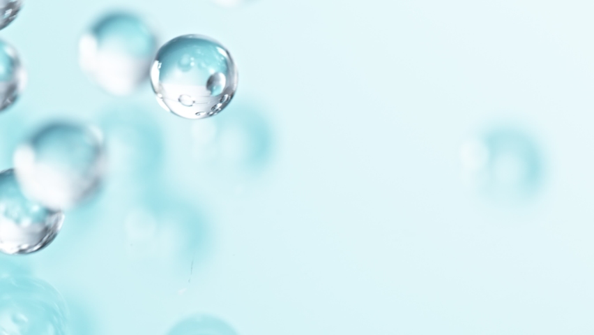 Super Slow motion Shot of Hydrogel Balls Bouncing on Glass at 1000fps. | Shutterstock HD Video #1082795398