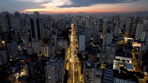 Downtown Sao Paulo sunset hyper lapse. Sunset landscape of illumination city. Great urban aerials landscape. Downtown Sao Paulo, Brazil. Time lapse city. Time lapse traffic. São Paulo Brazil.