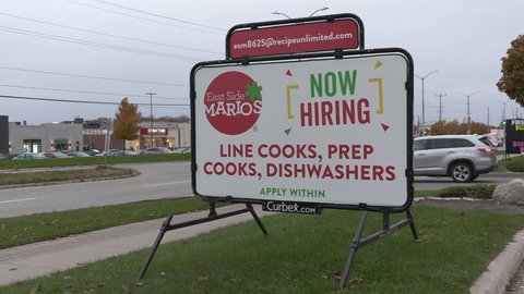 Guelph, Ontario, Canada November 2021 Hiring sign for jobs and employment during labour shortage