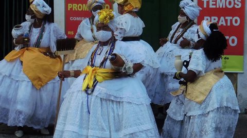 salvador, bahia, brazil - november 20, 2021: Candomble members and black entities participate in washing the statue of black leader Zumbi dos Palmares in the Historic Center of the city of Salvador.