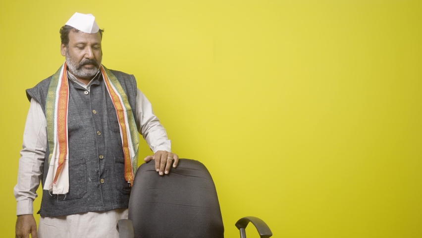 Greedy Politician thinking about power by seeing and walking around chair - concept showing of political dream to rule the society.