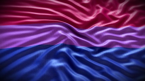 Bisexual Rainbow LGBT flag on blue sky waving in the wind with high-quality texture in 4K. lesbian, gay, bisexual, transgender social movements. Concept of happiness freedom love same-sex couple