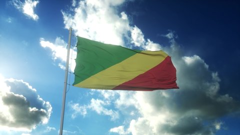 Congo Republican flag waving at wind against beautiful blue sky