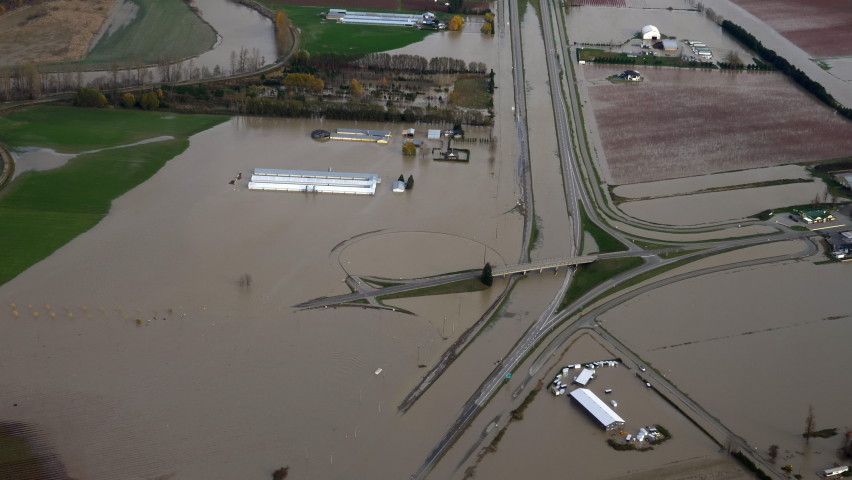 Floodwaters Cover Highway And Fields Due To Heavy Rains In Abbotsford, British Columbia, Canada. - aerial | Shutterstock HD Video #1082813533
