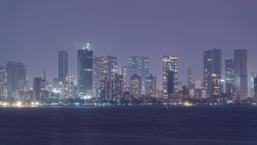 4k Time Lapse of Mumbai Night View facing Arabian Sea, Time Lapse and Sea face view of rising skyscrapers of city of Mumbai, Maharashtra, India