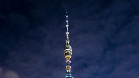 Moscow, Russia - 11 11 2021: Time Lapse of Ostankino Tower in a cloudy winter night