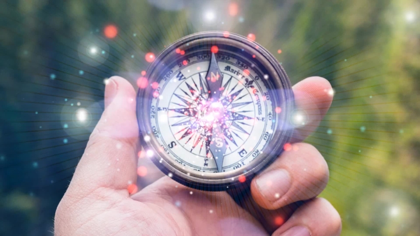 compass in hand system energy research a stream of luminous particles, a cycle of a stream of luminous particles. light effects moving and flexible lines in abstract style Royalty-Free Stock Footage #1082845300