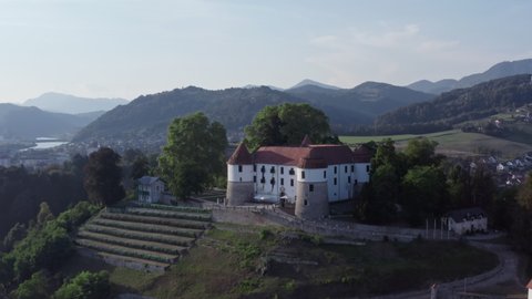 Aerial view castle Novo Mesto Slovenia. Historic castle with high walls on a mountain in the historic city.