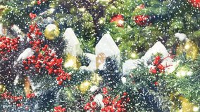 Christmas tree is decorated with toys and garlands outdoors under the falling and swirling snow. New year colorful background. Animated 4K video.