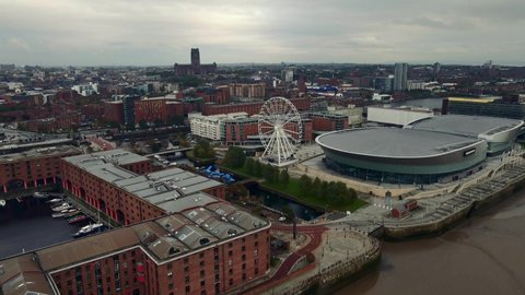 Liverpool, Merseyside, England- September 20th, 2021: Aerial drone view of Liverpool Skyline and the Mersey river. Waterfront in the evening.