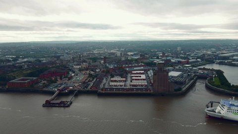 Liverpool, Merseyside, UK - September 20th, 2021: Aerial drone view of Liverpool Skyline and the Mersey river. Port in Liverpool 