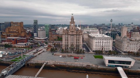 Liverpool, Merseyside, UK - September 20th, 2021: Aerial drone view of Liverpool Skyline and the Mersey river. Port in Liverpool 