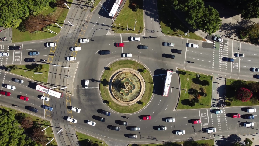 Aerial drone footage of a traffic circle intersection in the heart of Seville city in Andalusia, Spain