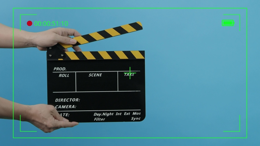 Movie Clapper Board. Hollywood Director Film Slate. Film crew hold and clapping film slate in video recording. Using for cut action or visual effects and scene prop. Clapperboard of movie production. | Shutterstock HD Video #1082860792