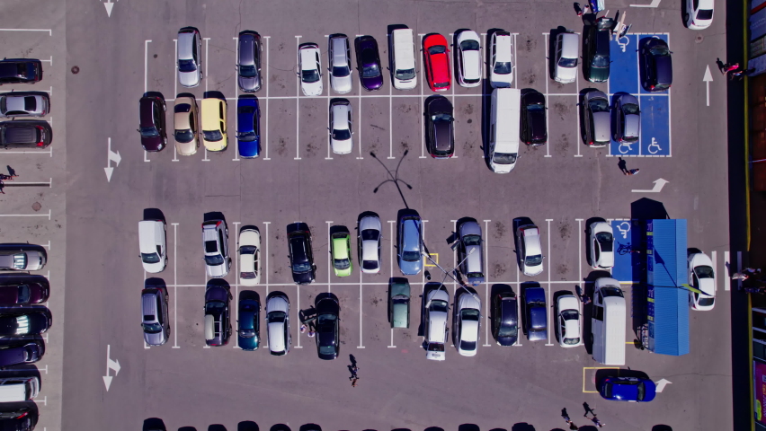 Aerial footage of a busy car park in the town