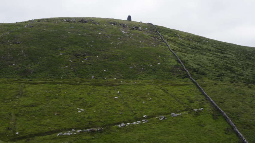 AERIAL - Eask Tower in Carhoo Hill, Dingle, County Kerry, Ireland, forward shot