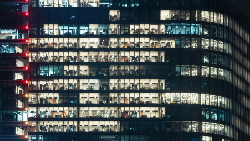 Time lapse modern glass business center windows lights turned off after working day, blinking office windows light building facade, people working late night. Corporate, skyscraper surface. End of day Royalty-Free Stock Footage #1082876293