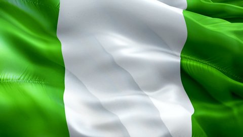 Nigeria flag video. National 3d Nigerian Flag Slow Motion video. Nigeria Flag Blowing Close Up. Nigerian Flags Motion Loop HD resolution Background Closeup 1080p Full HD video. Nigeria flags waving in
