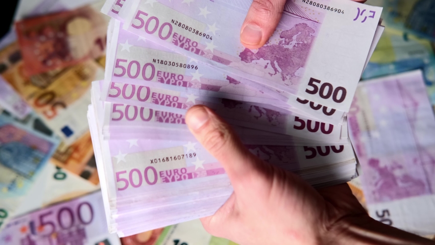 closeup female hands count paper 500 euro banknotes of european union, paper banknotes on table, concept of cash, payments, savings, banking, save up for vacation, car, winnings in a casino Royalty-Free Stock Footage #1082883250